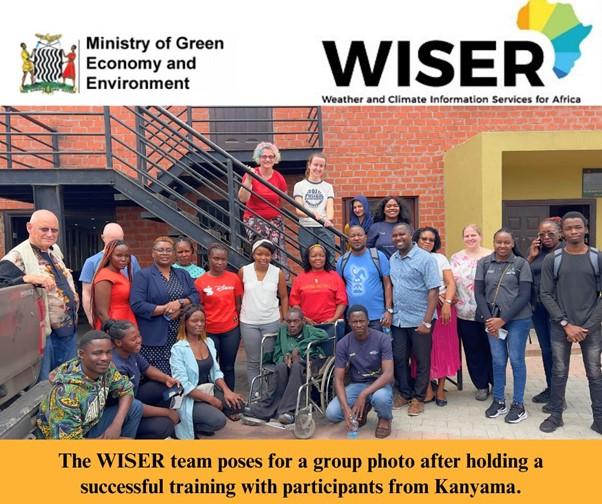 Group of more than 20 people outside a building and logos for Ministry of Green Economy and Environment and Weather and Climate Information Services for Africa